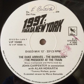 John Carpenter & Alan Howarth – The Duke Arrives (Disco 12″ Remix)
